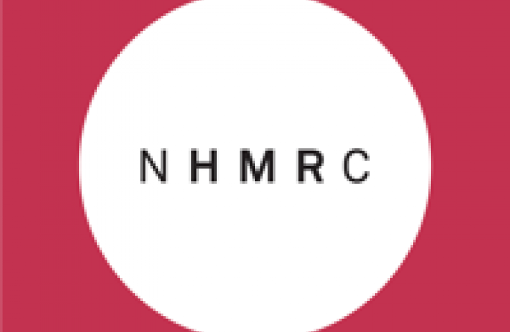 NHMRC is written in black writing on a white circle on a red background